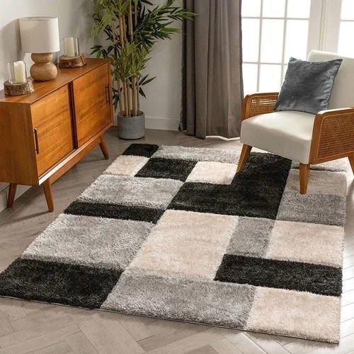 Shaggy rug collection at our Deira warehouse — real photo